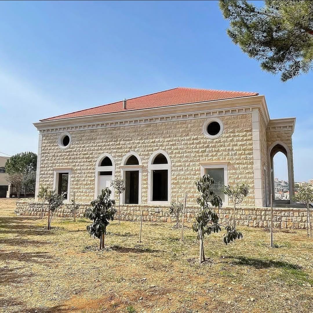 Stone residence designed by AMD